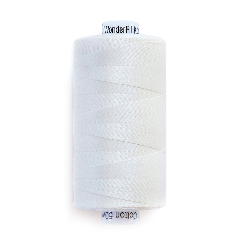 A spool of KT100 - White thread on a white background