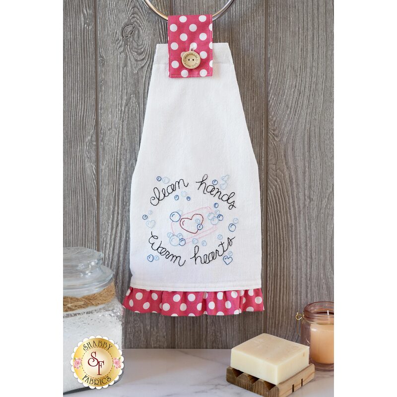 The adorable Clean Hands Warm Heart towel hanging from a towel rack | Shabby Fabrics