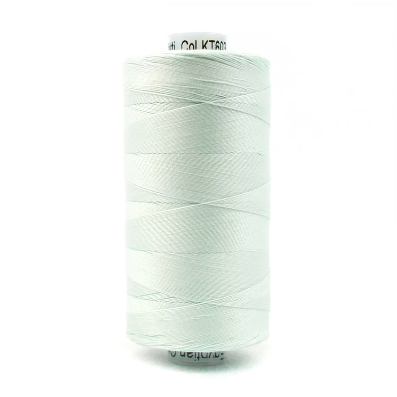 A spool of Konfetti KT603 - Pale Blue thread on a white background