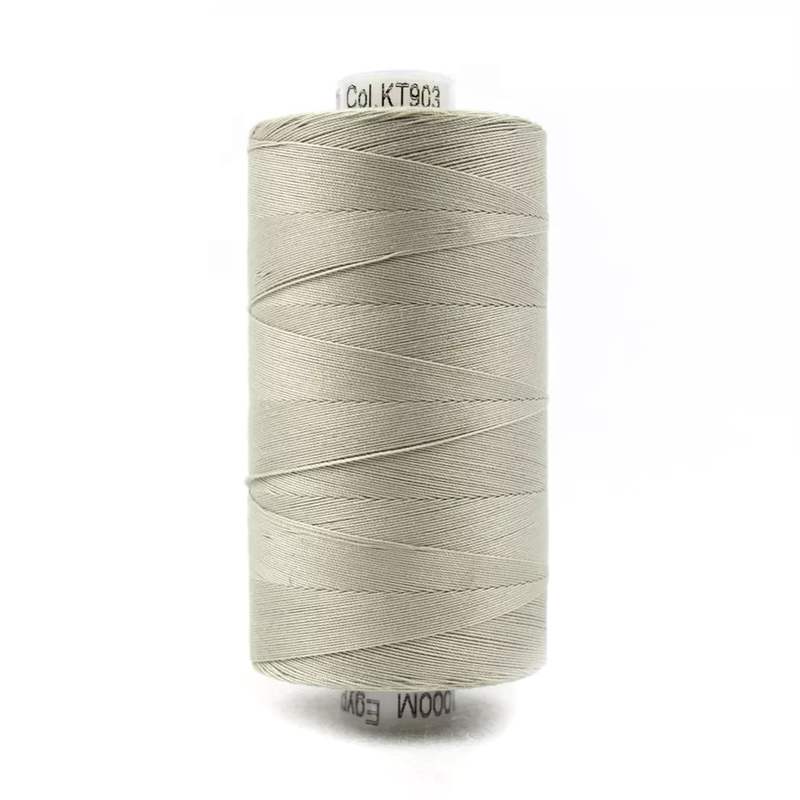 A spool of Konfetti KT903 - Very Light Grey thread on a white background