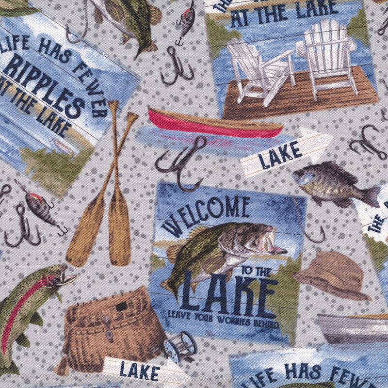 Fabric features fishing themes on a tonal gray dotted background | Shabby Fabrics