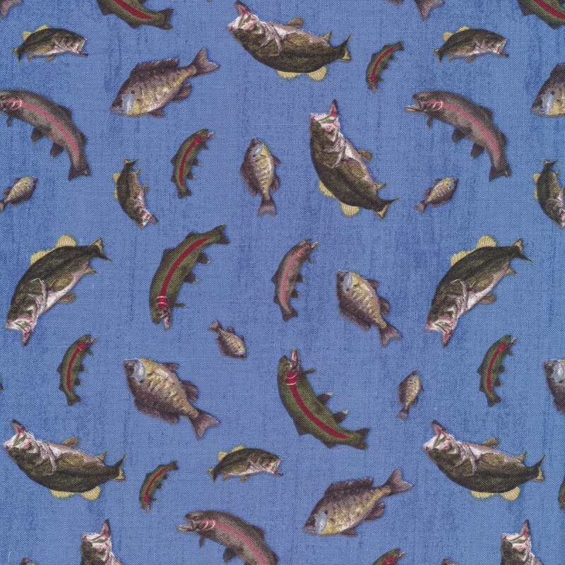 Fabric features assorted fish tossed on blue background | Shabby Fabrics