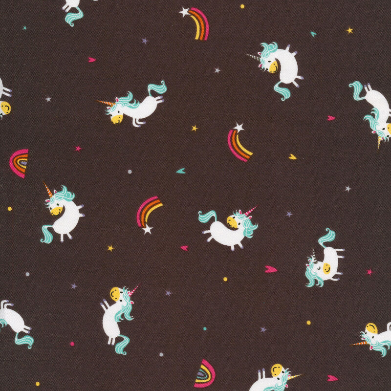 Tossed unicorns and shooting stars on charcoal grey | Shabby Fabrics