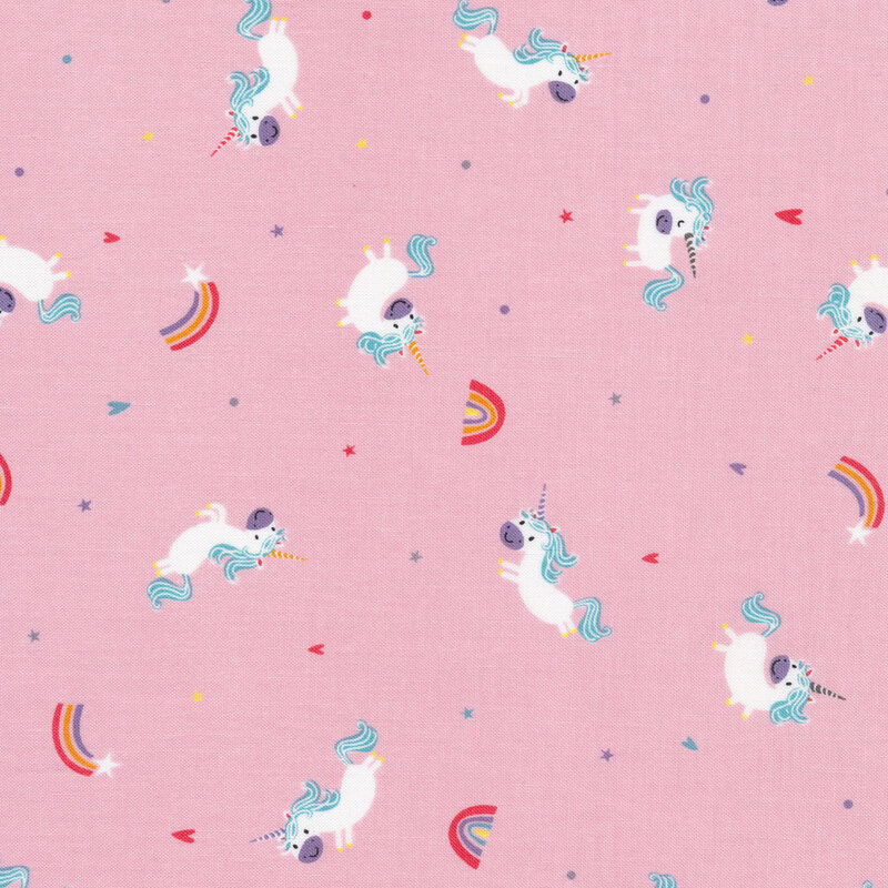 Tossed unicorns and shooting stars on pink | Shabby Fabrics