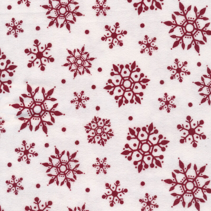 Cream fabric features red tossed snowflakes design | Shabby Fabrics
