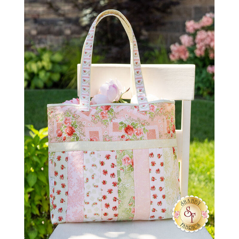 The Violet's Garden Sophie Tote displayed outside on a chair | Shabby Fabrics