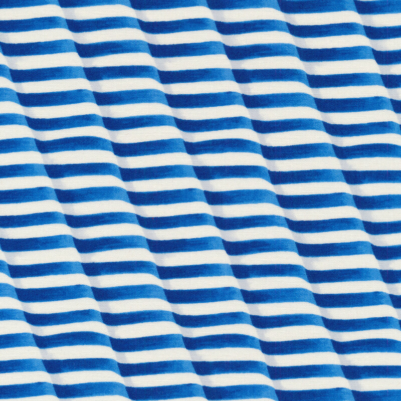 Fabric design features lines of wavy blue and white stripes | Shabby Fabrics