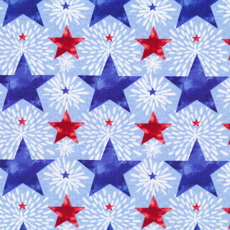 Red and blue stars and fireworks all over light blue | Shabby Fabrics