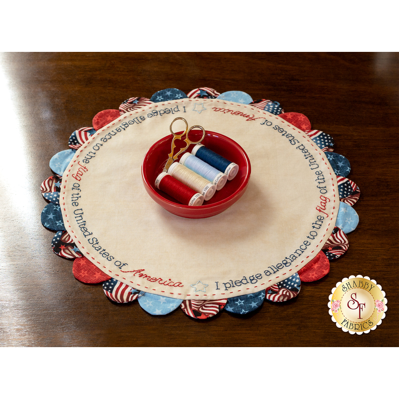 Scalloped Table Topper Kit - The Pledge of Allegiance displayed with a bowl of thread