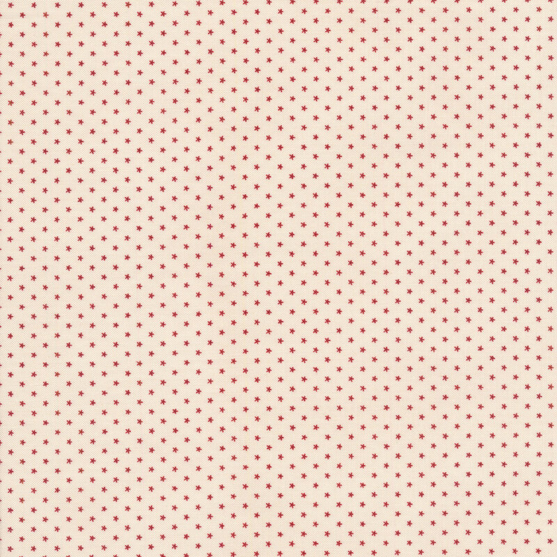 Small red stars on a cream background