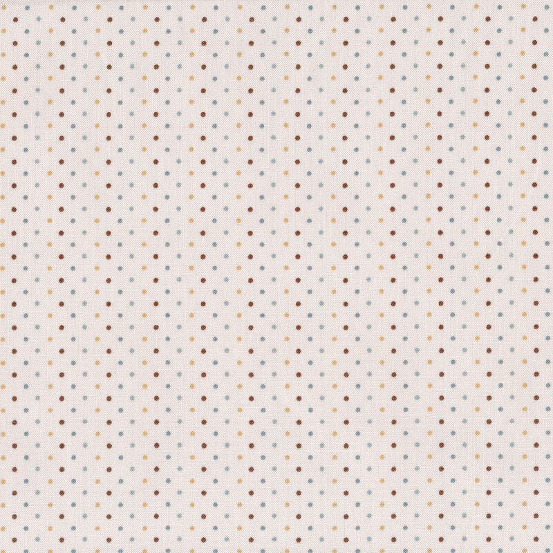 Black, tan, and blue dots on a cream background