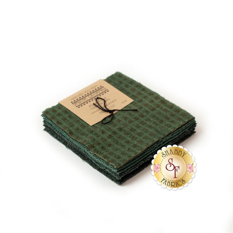 A stack of greenish wool 5