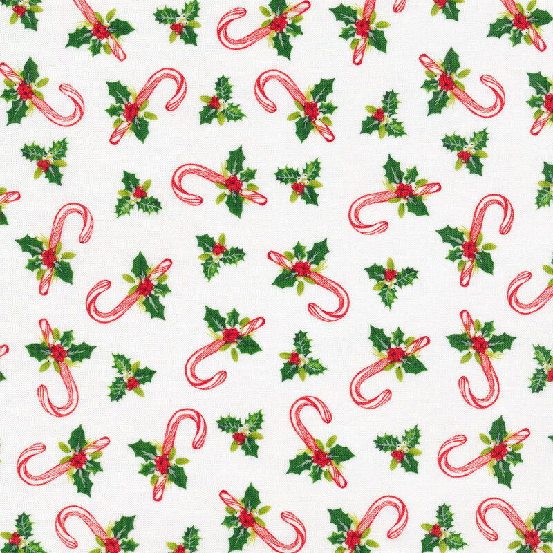 Tossed candy canes wrapped in holly on white | Shabby Fabrics