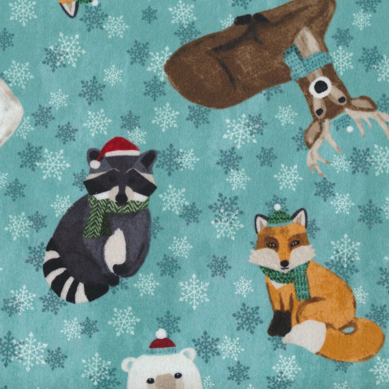 Polar bears, raccoons, deer, and foxes tossed on a tonal blue background | Shabby Fabrics