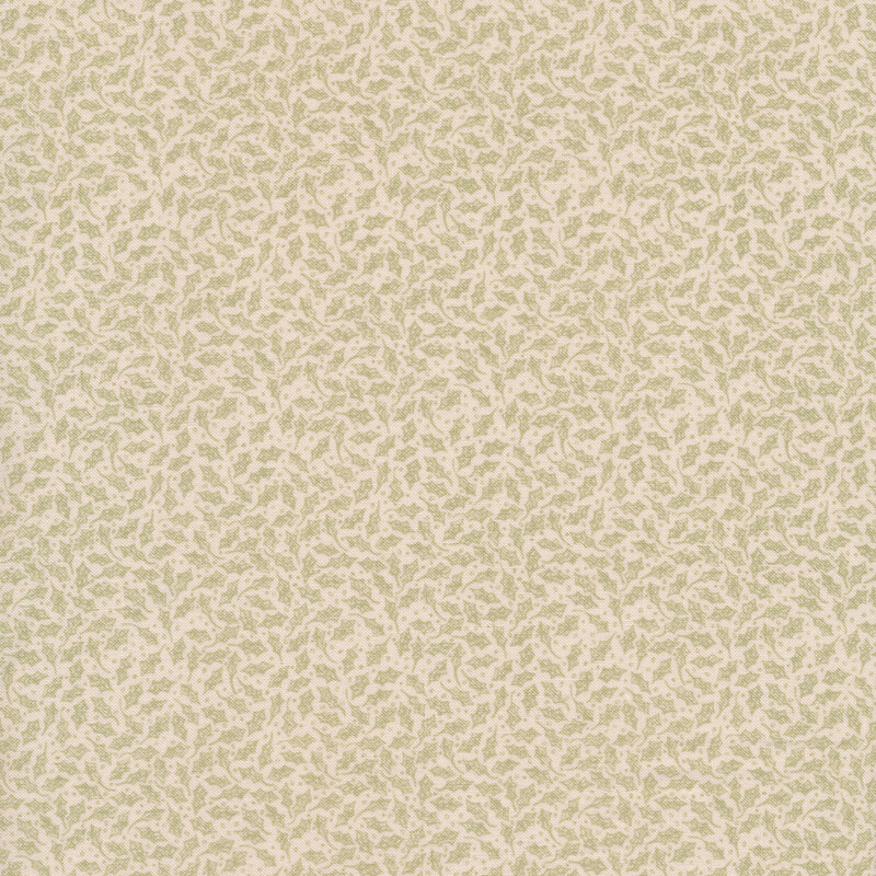 Fabric features primitive green holly leaf design on cream background | Shabby Fabrics