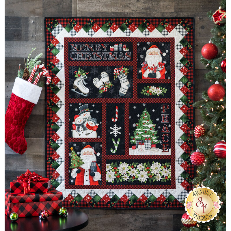 A Christmas quilt featuring 9 fun blocks hanging on a wall