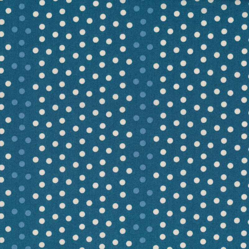 Cream and blue striped polka dots on a blue background