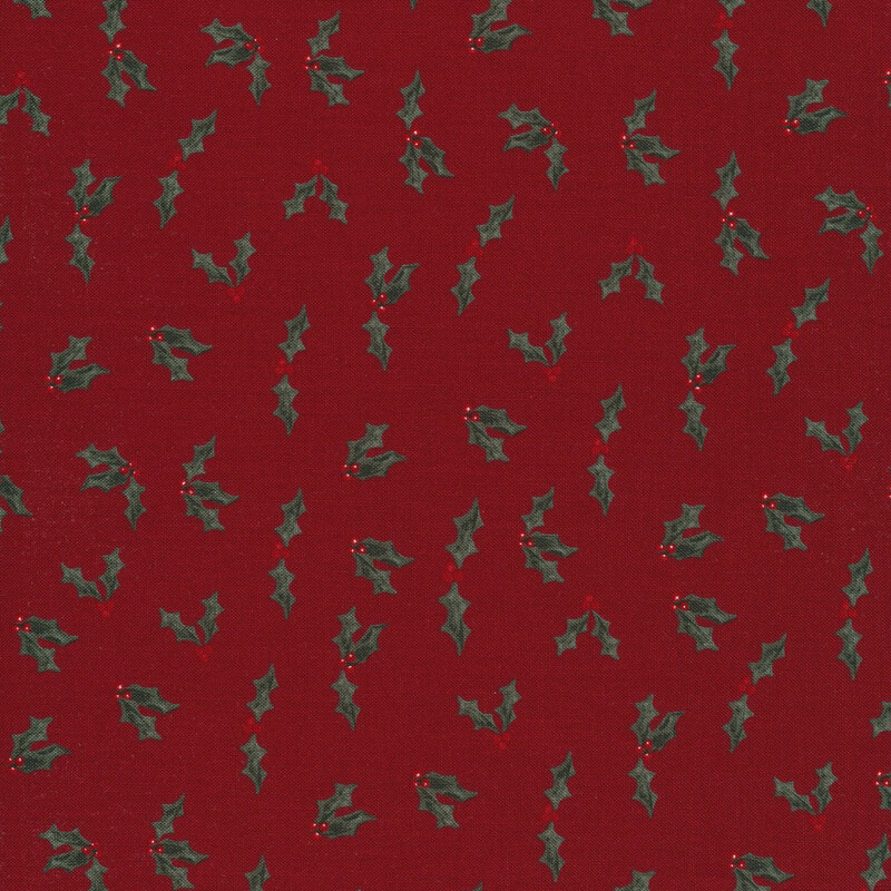 Dark red fabric features tossed holly and berries pattern | Shabby Fabrics