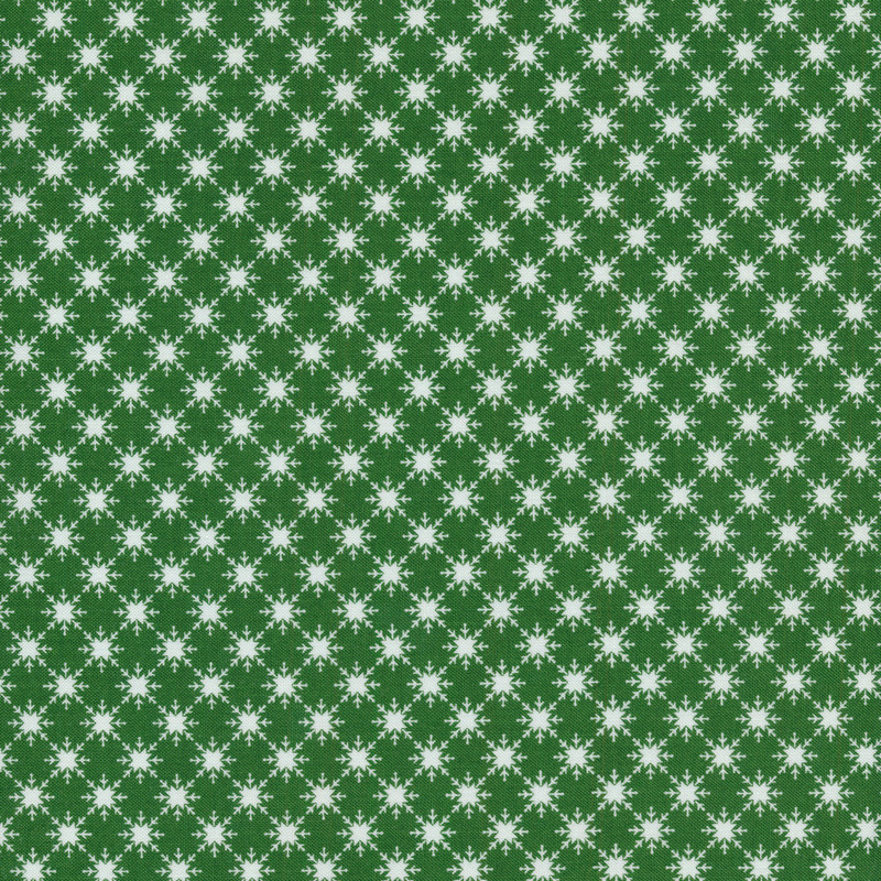 Green fabric features white snowflakes in connected diamond pattern | Shabby Fabrics