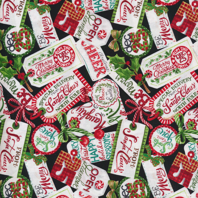 Fabric features Christmas and Holiday gift tags with bows on black background | Shabby Fabrics