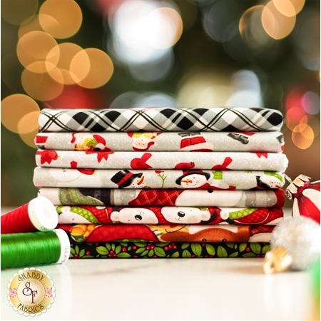 A collage of fabrics included in the Snow Merry FQ Set